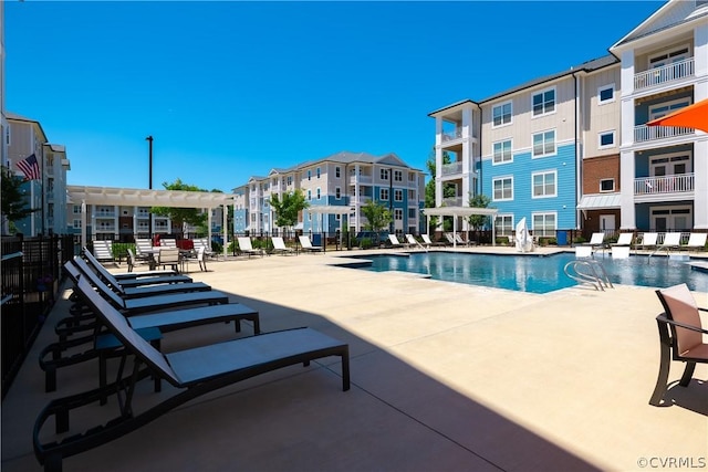 view of pool featuring a patio