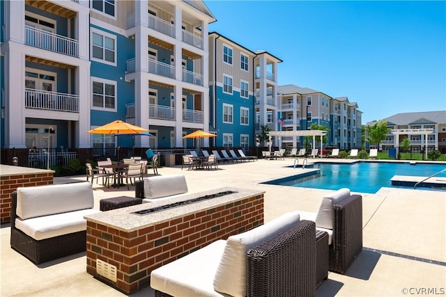 view of pool with a patio area