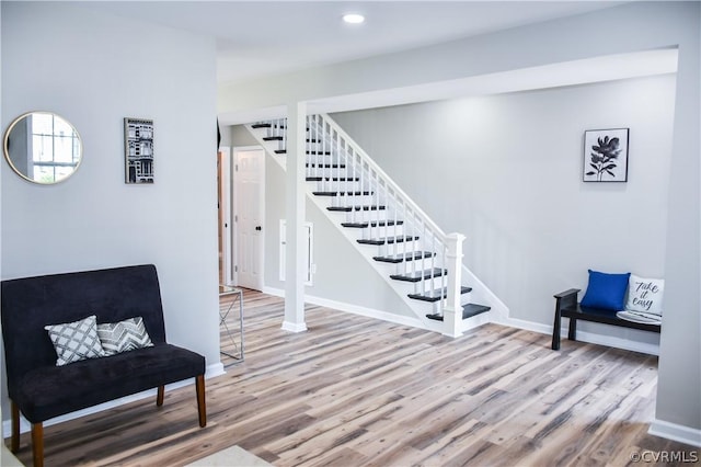 living area featuring hardwood / wood-style floors