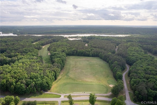 bird's eye view featuring a forest view