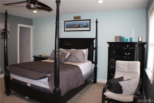 bedroom featuring ceiling fan and light colored carpet