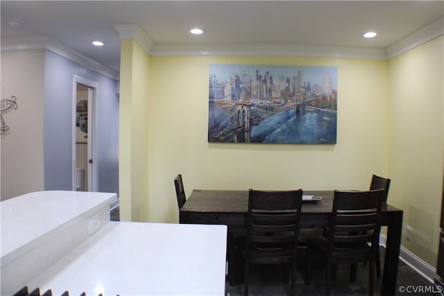 dining room featuring ornamental molding