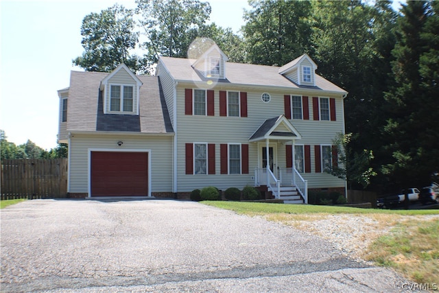 colonial inspired home with a garage