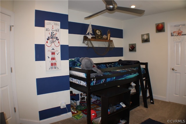 carpeted bedroom featuring ceiling fan