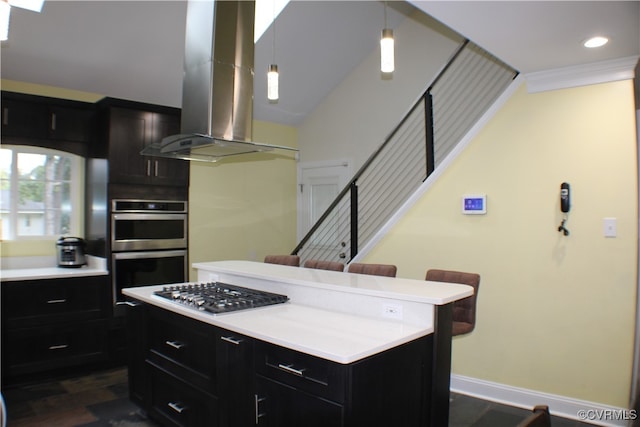 kitchen featuring stainless steel appliances, dark wood-type flooring, a center island, island exhaust hood, and decorative light fixtures