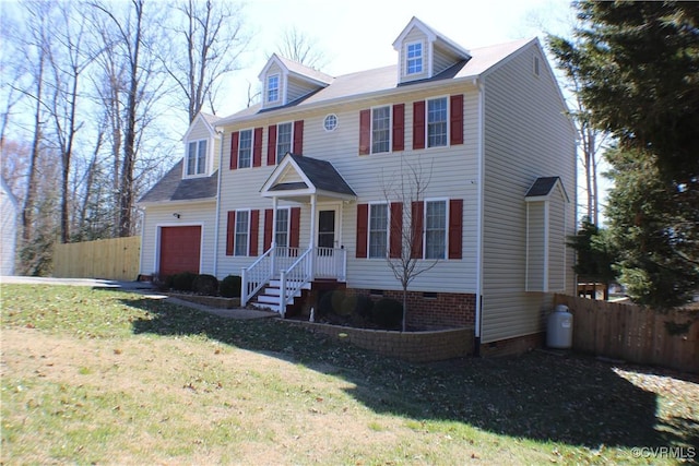 colonial home with crawl space, a garage, a front yard, and fence