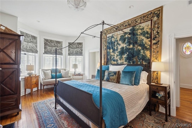 bedroom with wood-type flooring