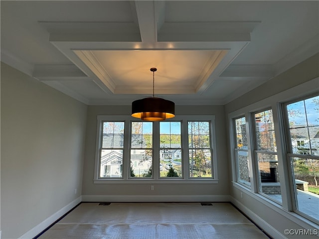 unfurnished sunroom with coffered ceiling and beamed ceiling