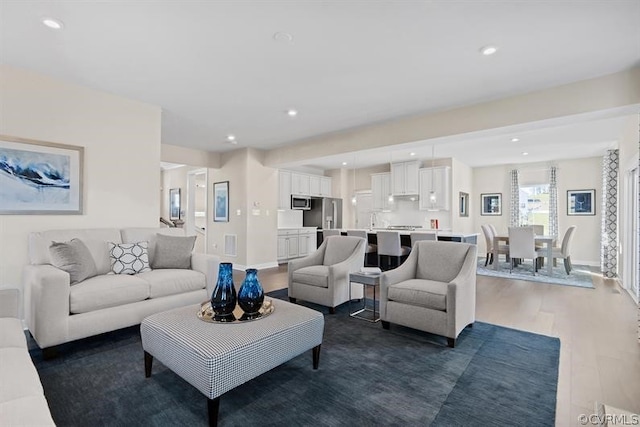 living room with dark wood-type flooring