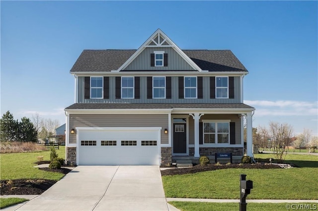 craftsman-style home featuring a garage and a front lawn