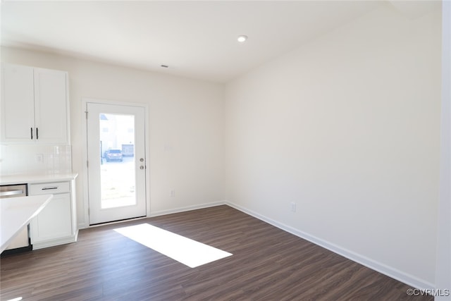 interior space with dark hardwood / wood-style flooring