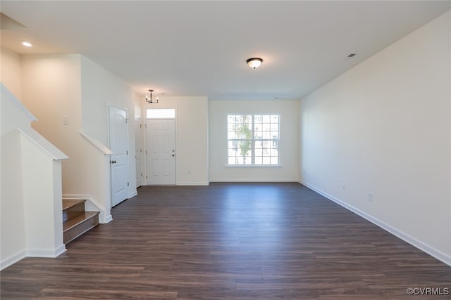 entrance foyer with dark hardwood / wood-style flooring