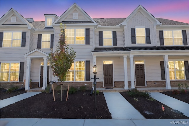 multi unit property featuring covered porch