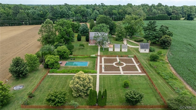 birds eye view of property with a rural view