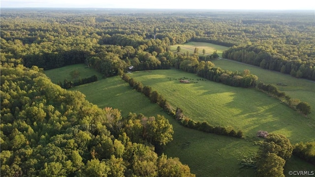 birds eye view of property with a rural view