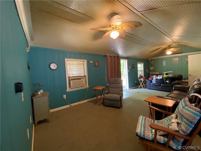 carpeted living room featuring ceiling fan and vaulted ceiling