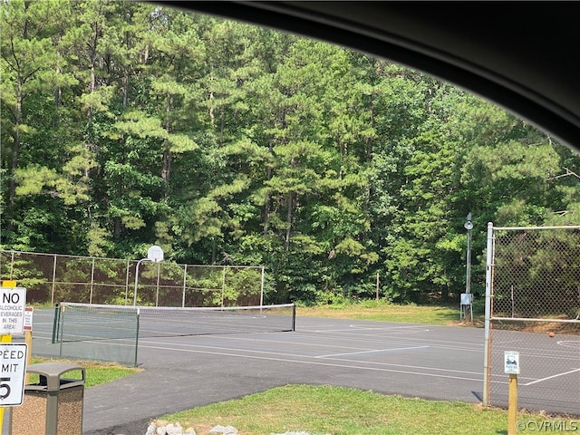 view of tennis court with basketball court