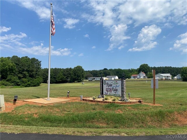 surrounding community featuring a lawn