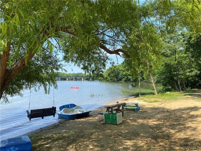 view of dock with a water view