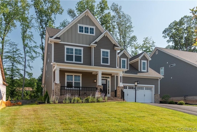 craftsman-style house with a porch, a front yard, and a garage