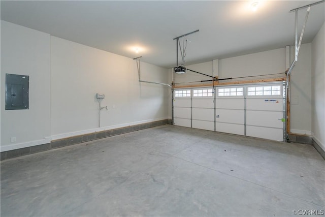 garage with electric panel and a garage door opener