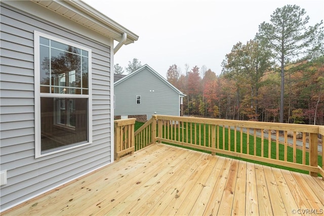 deck featuring a lawn