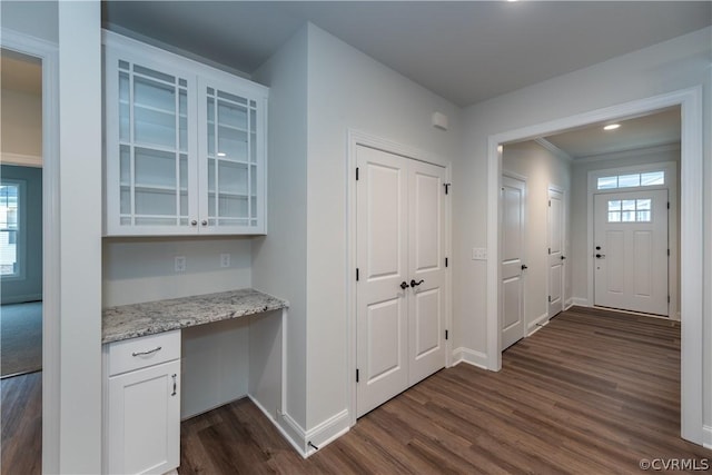 corridor featuring dark wood-type flooring