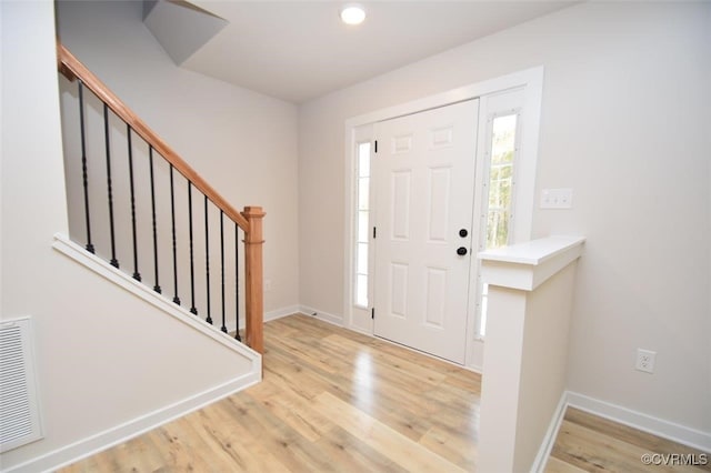 foyer featuring light wood-type flooring