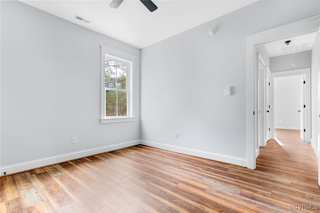 unfurnished room featuring ceiling fan and light wood-type flooring