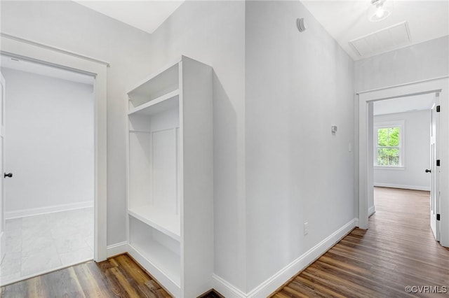 mudroom with dark hardwood / wood-style flooring