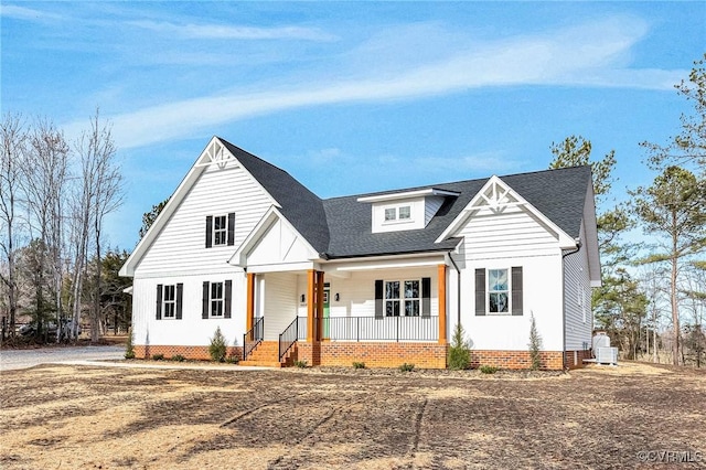 modern farmhouse featuring a porch