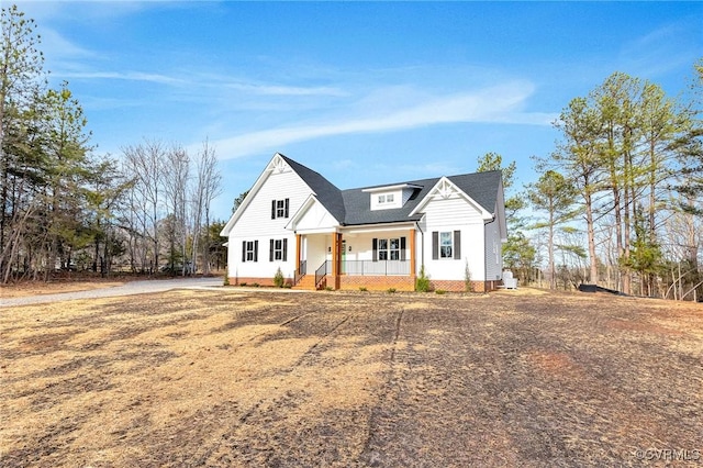 modern inspired farmhouse with a porch