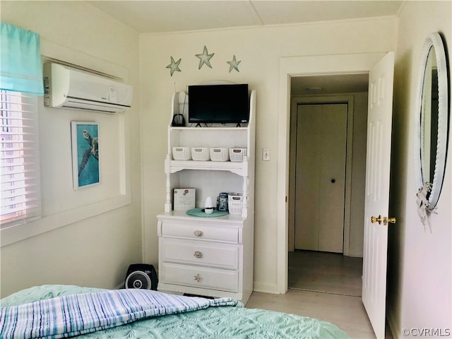 bedroom featuring a wall mounted AC