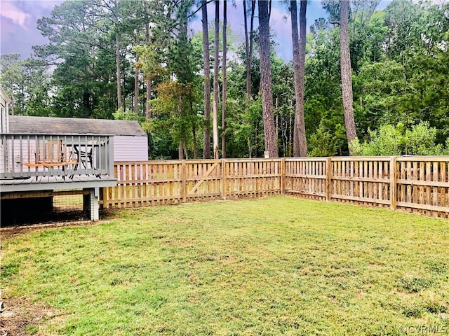 view of yard with a deck