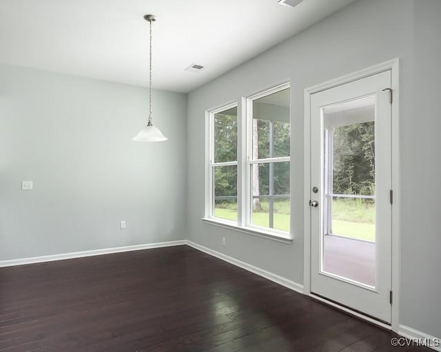 doorway to outside with dark hardwood / wood-style floors