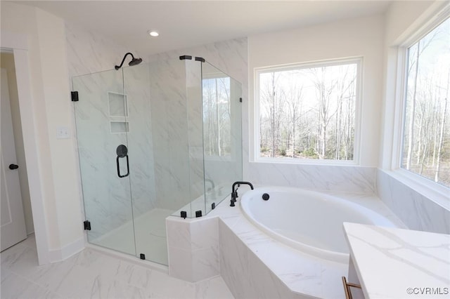 bathroom with independent shower and bath