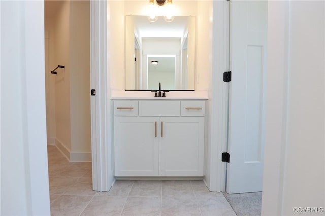 bathroom with vanity and tile patterned floors