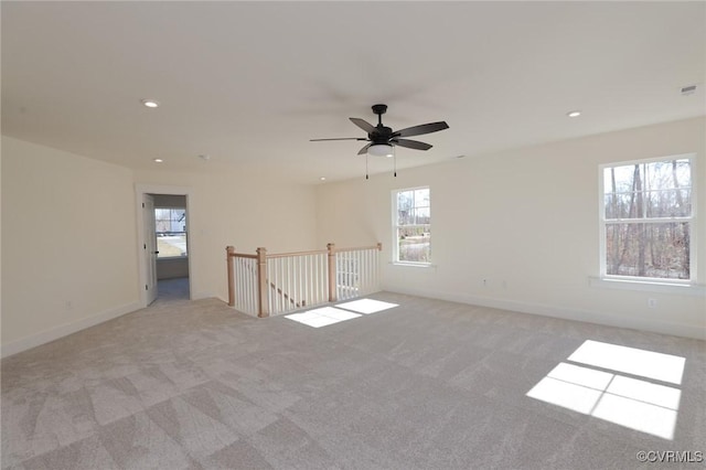 unfurnished room with light colored carpet