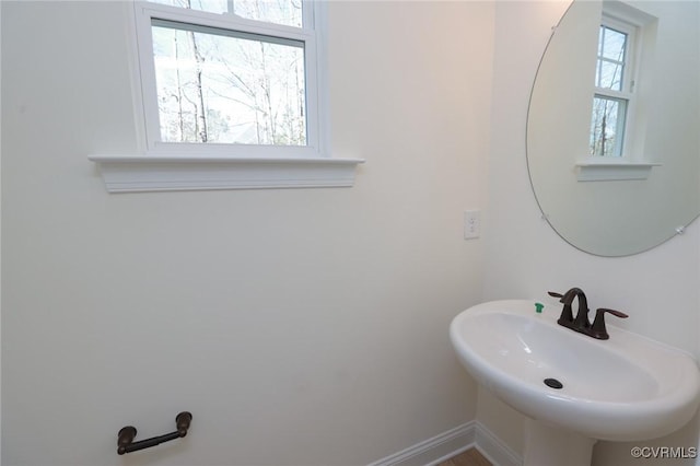 bathroom featuring sink and plenty of natural light