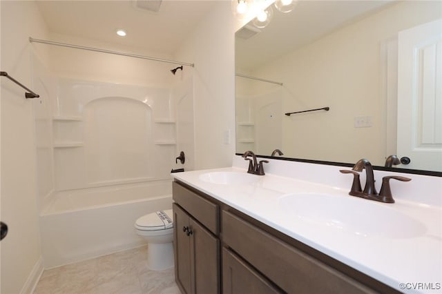 full bathroom with bathtub / shower combination, toilet, and vanity