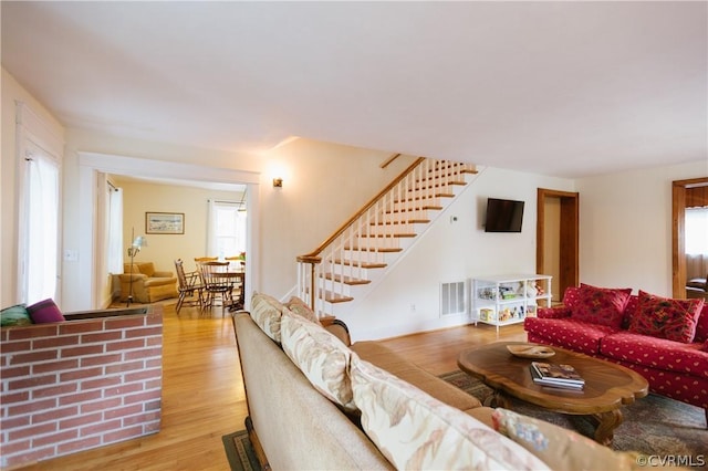 living room featuring light wood-type flooring