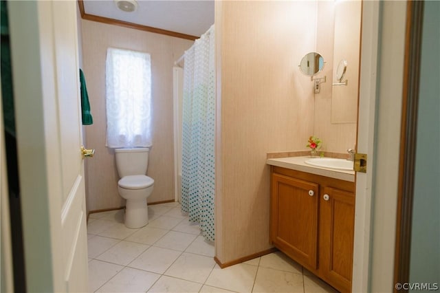 bathroom featuring toilet, curtained shower, tile patterned floors, crown molding, and vanity