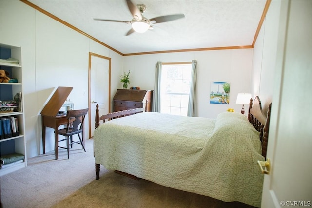 bedroom with ceiling fan, crown molding, and carpet flooring