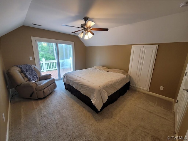 bedroom featuring light colored carpet, ceiling fan, vaulted ceiling, and access to outside