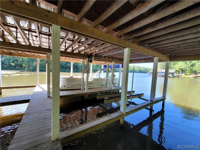 dock area featuring a water view