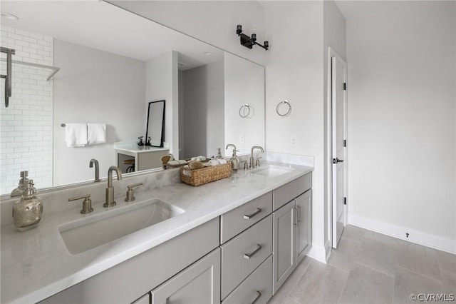 bathroom featuring tile patterned floors and vanity