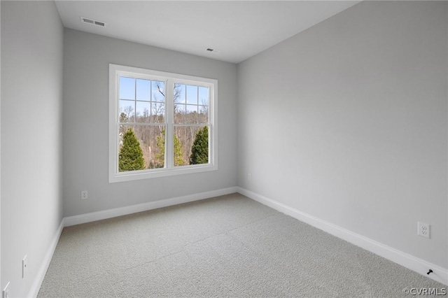 spare room with carpet flooring