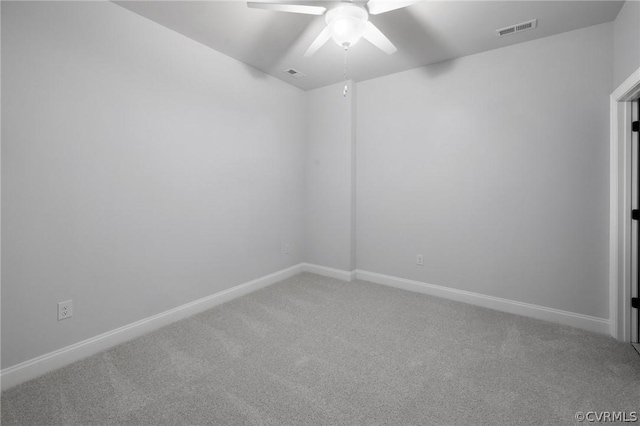 unfurnished room featuring carpet and ceiling fan