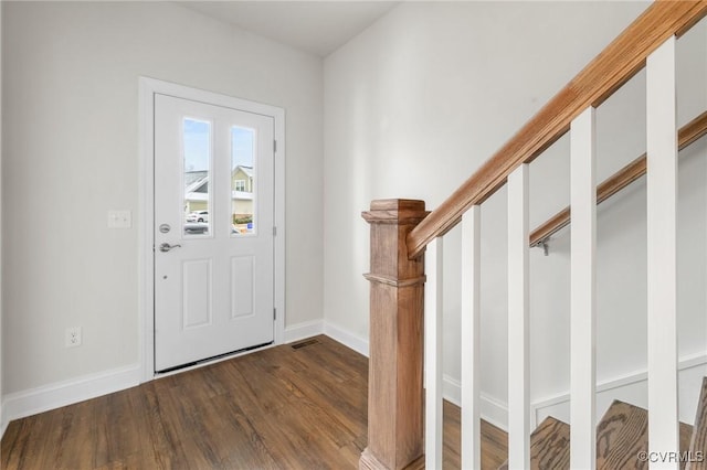 entrance foyer featuring dark wood-type flooring