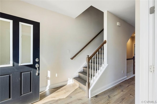 foyer with light hardwood / wood-style flooring